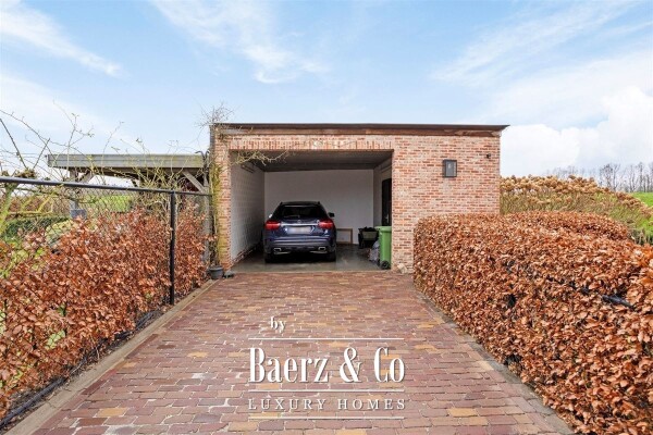 photo 37 Uitzonderlijke Duplex met zicht op kanaal, garage, carport en ruime (wijn)kelder!