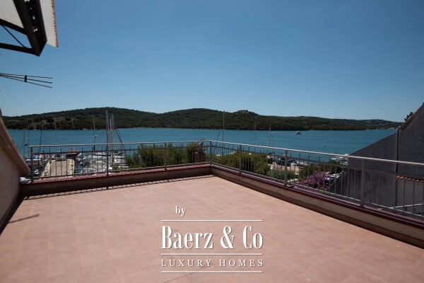 photo 1 Tisno, exclusive seafront apartment house with panoramic sea views and a boat