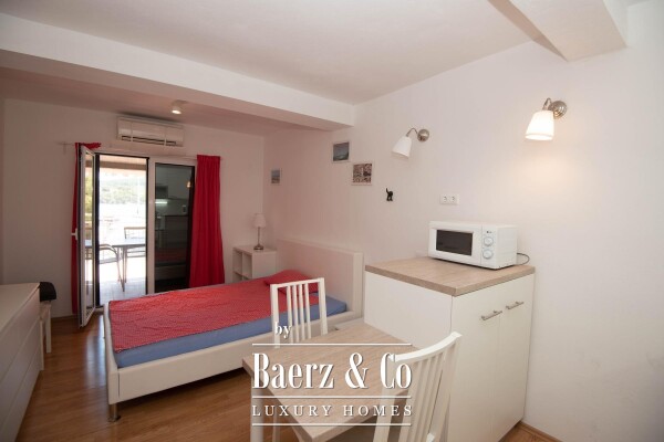 photo 26 Tisno, exclusive seafront apartment house with panoramic sea views and a boat